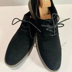 Black suede shoes.